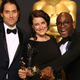 It took a while, but Jeremy Kleiner, Adele Romanski and Barry Jenkins eventually accepted their Oscars (Photo: Dan MacMedan/Getty Images)